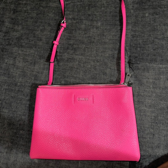 Two zipper pouches with magnetic button between , medium sized Guess clutch. - Picture 2 of 5